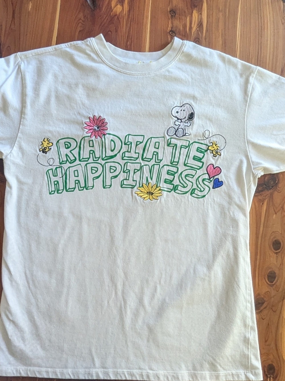 Peanuts White 'Radiate Happiness' Graphic Tee with Green Lettering